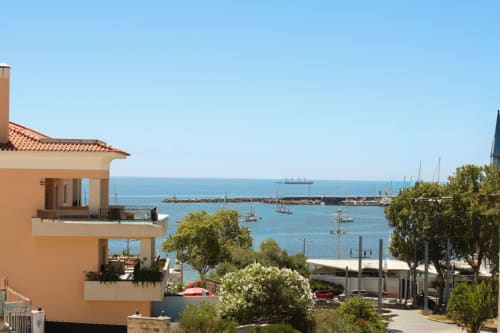 Sea'Ya Villas apartment in Cascais with ocean view, balcony overlooking marina and boats