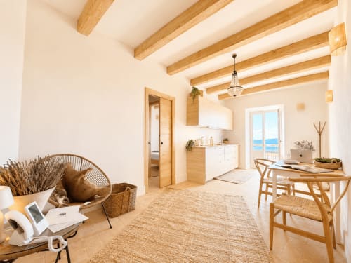Bright Tuscan Terrace Suite at Montemassi B&B with wooden beams, sea view, work desk, and garden access
