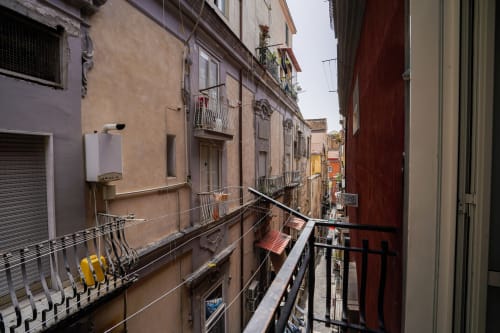 Napoli balcony view from Calaba Decumani apartment, colorful buildings and narrow street