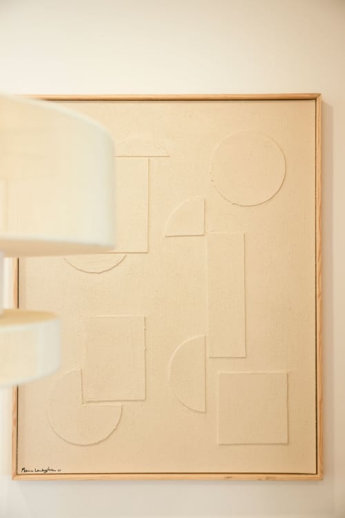 Minimalist wall art at Sea'Ya Villas featuring abstract geometric shapes and curves in neutral tones, Cascais