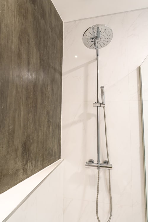 Modern shower setup in Suites Avenue Lux Apartments bathroom, Horta, Faial with rainfall showerhead and chrome fixtures