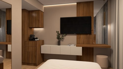 Modern bedroom in Feel Sintra hotel, Sintra, featuring wall-mounted TV, wooden furniture, white bed, and contemporary decor