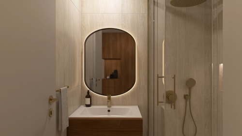 Modern bathroom in Feel Sintra's D. Afonso VI room, Sintra with illuminated mirror, wooden vanity and rainfall shower