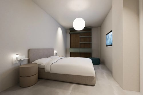 Camera moderna di Vahospitality con letto imbottito grigio, lampada a sospensione e design minimalista in Francia