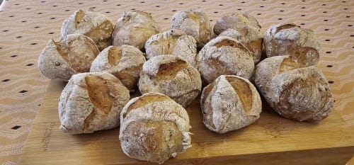 Freshly baked artisan bread rolls at Aux Prés Du Berry, a charming bed and breakfast in Chavin, France.