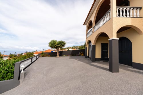 Spacious terrace of Michaels Garden apartment at Garry's Holiday Rentals in Estreito da Calheta with ocean views and garden