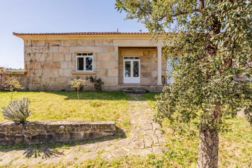 Stone villa in Chaves garden with terrace, ideal 6-bedroom vacation rental