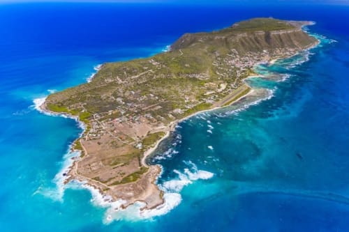 Aerial view of Sainte-Anne peninsula, Guadeloupe with turquoise waters and lush coastal landscape