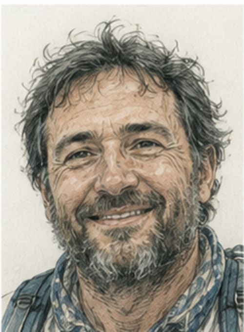 Smiling bearded man portrait at Bom Caminha hostel in Caminha, Portugal