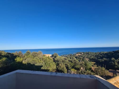 Sea view from Villa Eva terrace at Corsu Di Core, Favone, with Mediterranean coastline and lush vegetation