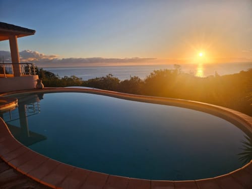 Heated pool at sunset overlooking the sea at Villa Eva, Corsu Di Core, Favone Corsica
