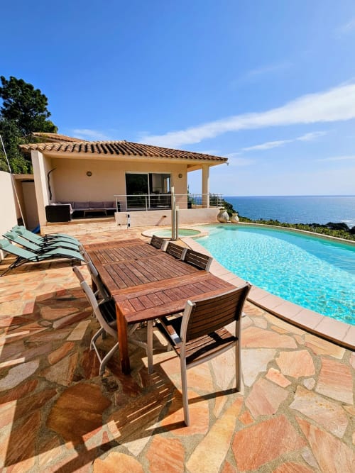 Villa Eva at Corsu Di Core, Favone: Luxury sea-view villa with heated pool, dining area, and Mediterranean coastline