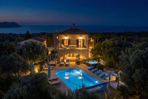 Villa Freedom luxury Cretan villa with illuminated pool at twilight, Kokkino Chorio