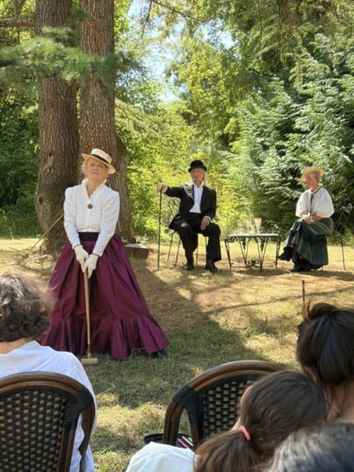 Historical reenactment performers in period costumes at Domaine de l'Ocrerie, a French bed and breakfast in Pourrain,