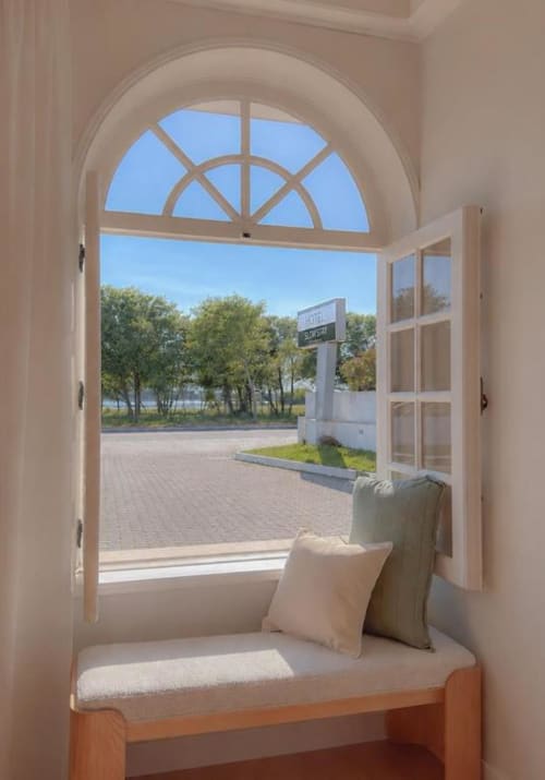 Window seat with cushions overlooking parkland at Hotel Slow Stay in Esposende, Portugal