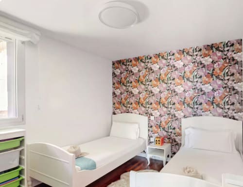 Bright children's bedroom in Gran Canaria villa with twin beds, floral accent wall, and modern amenities