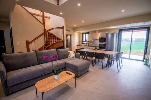 Duplex Boulage apartment at Lieu-dit Boulage in Marquefave with modern open-plan living, kitchen, dining area, and wooden