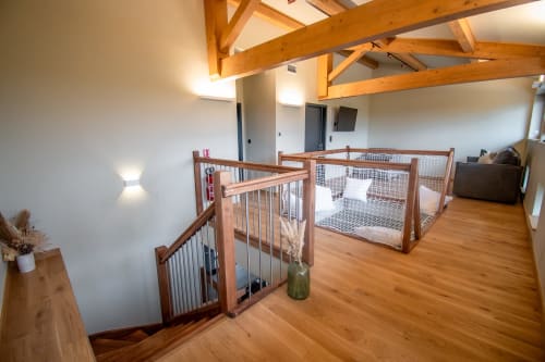 Duplex apartment at Lieu-dit Boulage with wooden beams, gated play area, and open-plan living space