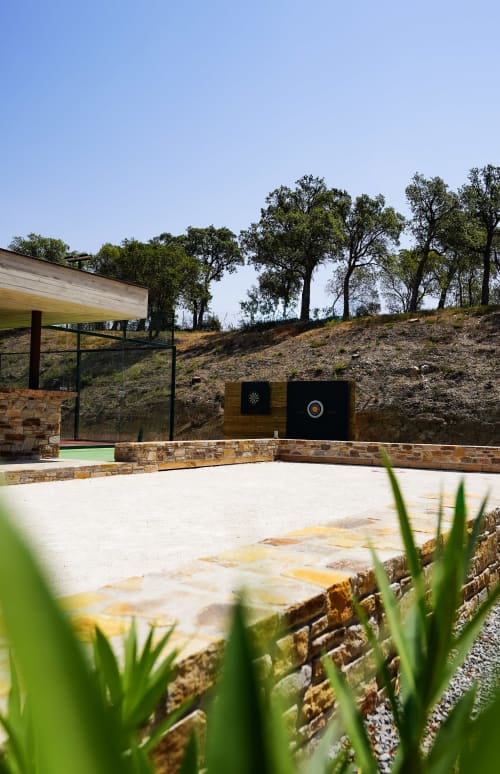 Villa Nais axe throwing range in Bormes les Mimosas with stone targets and sunny hillside