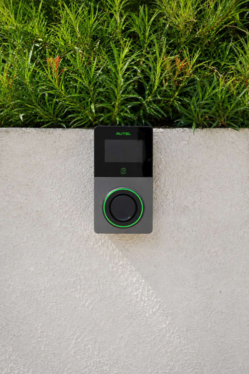Autel EV charging station mounted on concrete wall at Villa Nais in Bormes les Mimosas