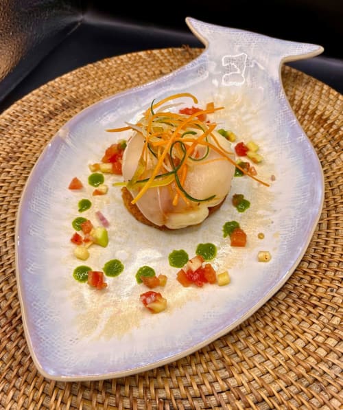 Scallop dish with colorful garnish at OPOA Beach Hôtel, Uturoa, French Polynesia