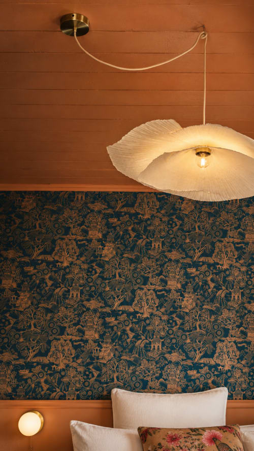 Sakura room at La Maison 1903 B&B in Trévou-Tréguignec, France, featuring designer pendant lamp and patterned wallpaper