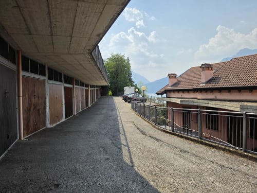 Equestrian facility with covered stables and mountain views at Villa Vista Lago di Como in Bellano, Italy
