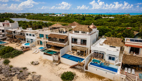 Oceanfront luxury cottage Casa Javi in Isla Mujeres with private pool, beach access, and turquoise Caribbean sea views