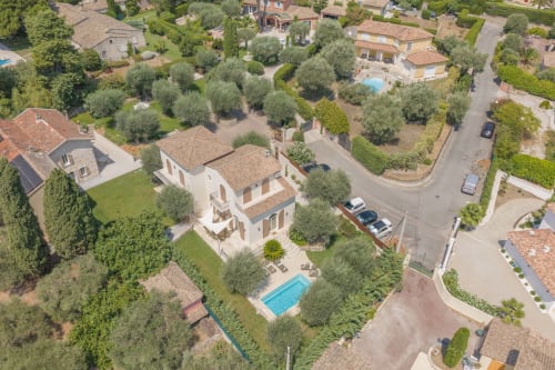 Aerial view of Villa M de Mas with private pool in Grasse, surrounded by Mediterranean gardens and olive trees