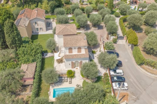 Aerial view of Villa M de Mas with private pool in Grasse, surrounded by olive trees and Mediterranean gardens