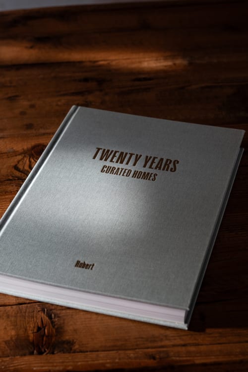 Twenty Years Curated Homes book on wooden table at Domaine Belhazar, Essaouira