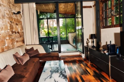 Elegante apartamento con vista al jardín en Villa Raspail, sala de estar, pisos de madera y acceso a terraza en Ivry-sur-Seine