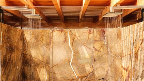 Luxury bathroom with dual rainfall showerheads and marble walls at La Hacienda Tepoztlan, Tepoztlán