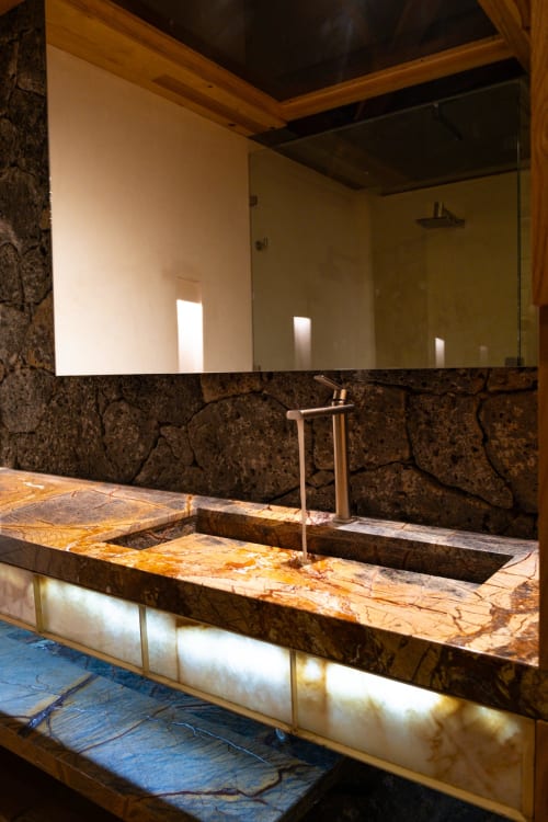 Luxurious bathroom sink with marble countertop at La Hacienda Tepoztlán cottage in Tepoztlán, Mexico