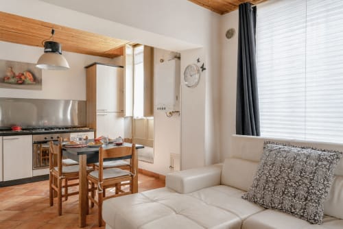 Bright Superior apartment at I colori della Sicilia in Caltagirone featuring modern kitchen, wooden dining table, cream sofa