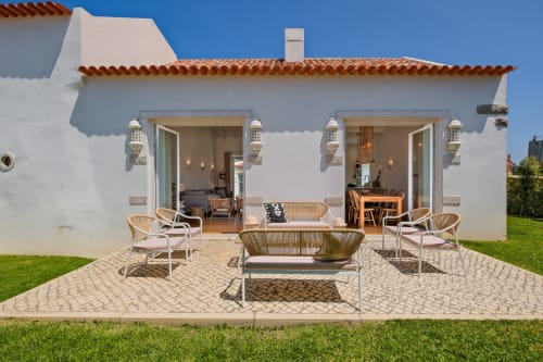 Sea'Ya Villa Juso terrace with lounge seating, patio furniture, and mountain views in Aldeia de Juso, Portugal