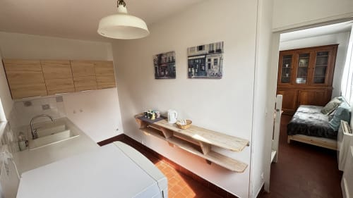 Le Chambre du Fournil at Le Gite De Saint Phal BnB featuring kitchen, dining area, and bedroom access