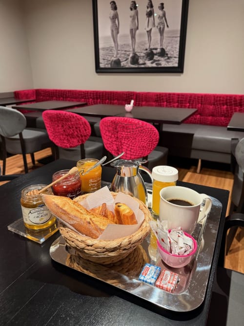 Continental breakfast spread at Hôtel Des Dunes with pastries, coffee, and jams in La Baule-Escoublac