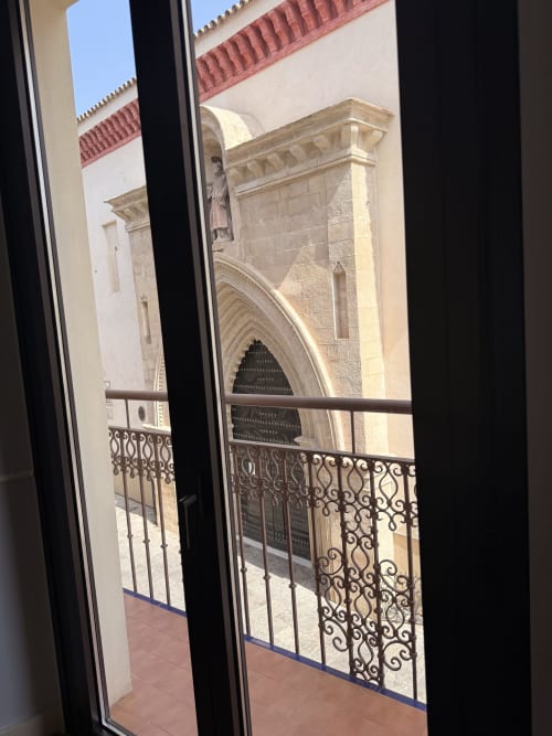 Vista desde el balcón de la Catedral de Sevilla desde la Suite San Fernando del hotel Edificio San Esteban 16