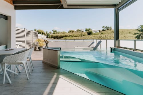 Private pool terrace at Le Malanga apartment, Habitation I'SEO, Sainte-Anne with lounge chairs and tropical views