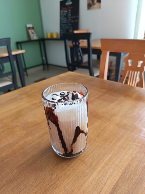 Chocolate drizzle beverage served at Le Clos du Thoronet café in Le Thoronet, France