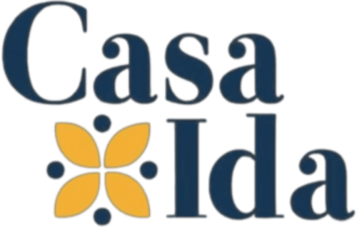 Logo Casa Ida - bed and breakfast italiano con motivo floreale dorato e testo blu navy