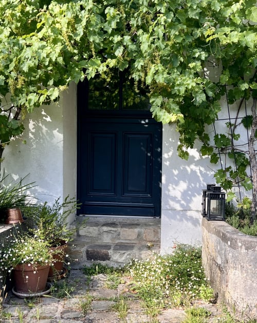 Porte d'entrée des Anciennes Écuries du Château, un gîte restauré 
