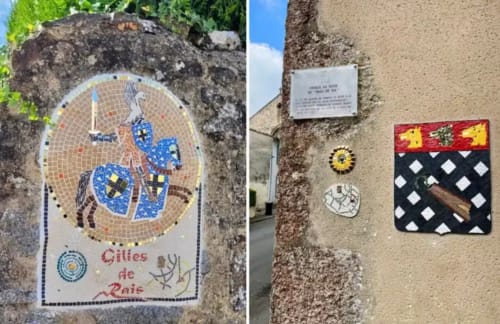 Carreaux héraldiques médiévaux et plaques de mosaïque sur les murs de pierre de la maison d'hôtes Le Petit Moulin à Pouzauges
