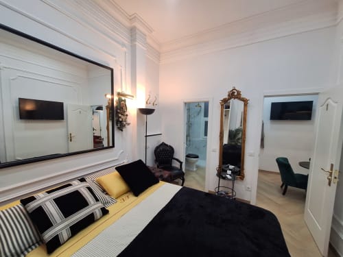 Luxurious double bedroom at Salamanca Luxury Rooms in Madrid with elegant furnishings and modern amenities