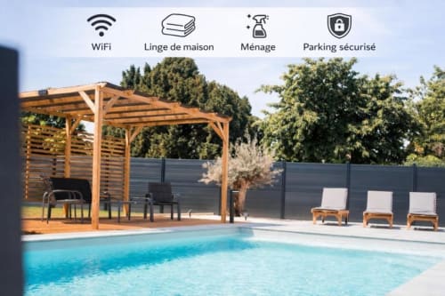 Swimming pool at Résidence des Sables in Mably with wooden lounge chairs, pergola, and secure parking area