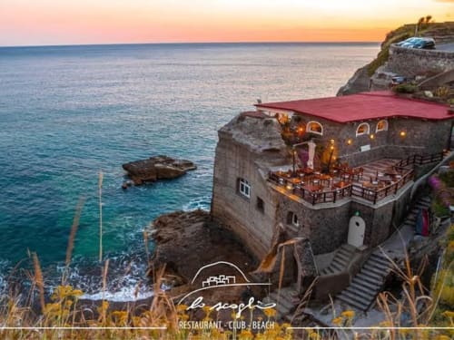 Ristorante affacciato sul mare a Villa Bina Sea Hotel con vista tramonto sul Mediterraneo, Serrara Fontana