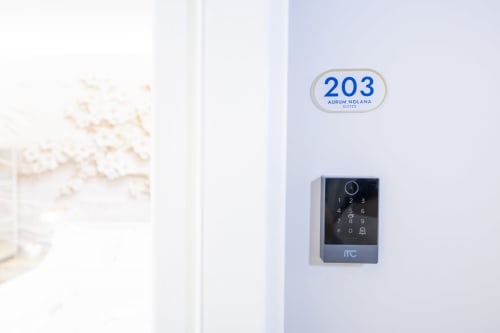 Tastiera d'accesso per la Camera 203 al resort Aurum Nolana Suites di Pompeii con serratura digitale