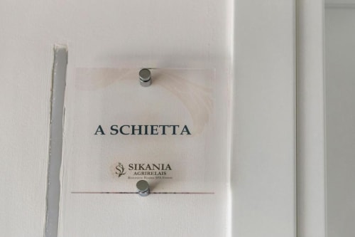Schietta room nameplate at Sikania Agri Relais hotel in Caccamo, Italy