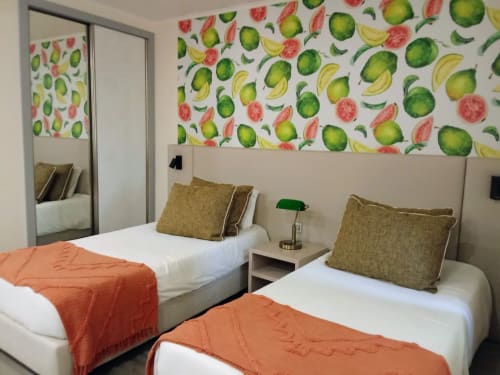 Twin bedroom at Tropical Solutions in Funchal with tropical fruit wallpaper and sea view